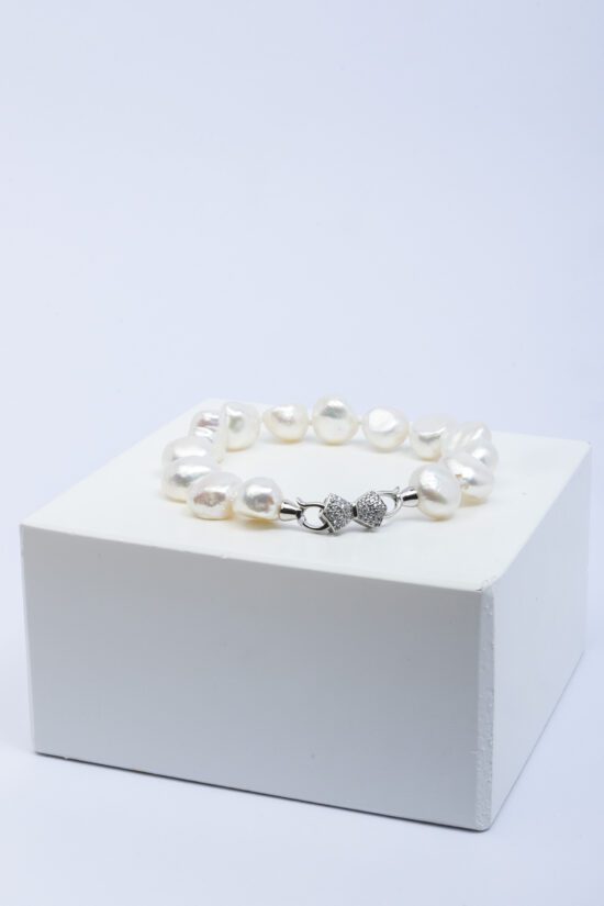 Pulsera perla fornitura forma lazo+circonita